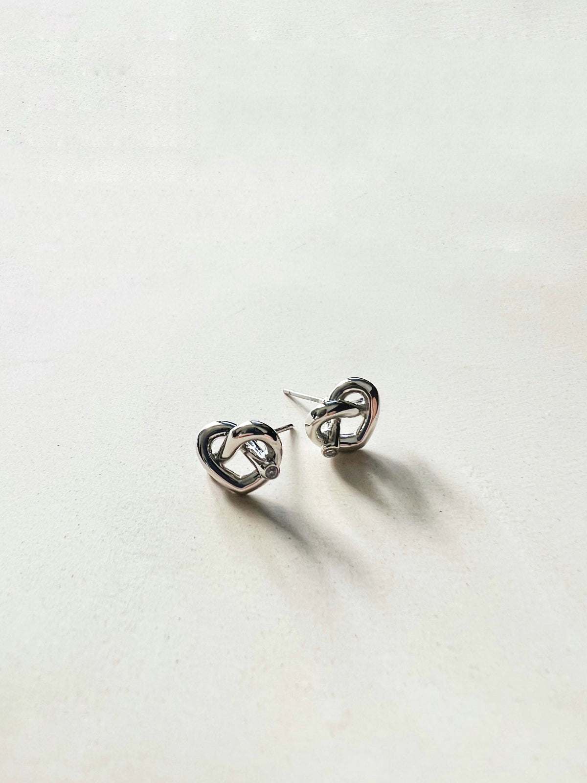 KYRA HEART EAR STUDS