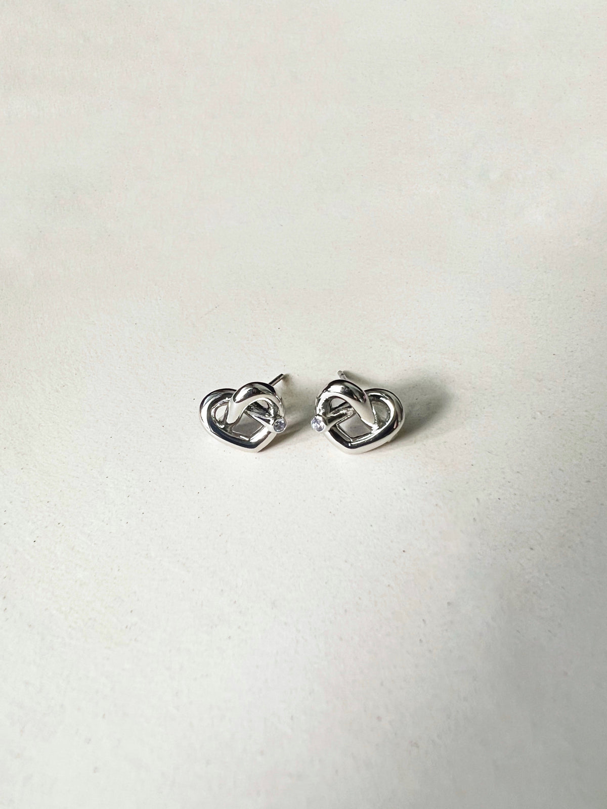 KYRA HEART EAR STUDS