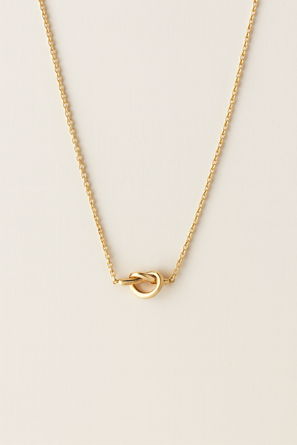 Gleam Knot Charm Necklace